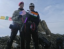 U.S. Army Capt. Mathew Hickey and Indian Army Maj. Sanat Kumar at the summit of Machoi Peak on 7 July 2013.