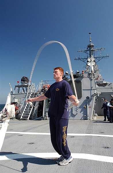 File:US Navy 070523-N-5459S-039 Lt. Steven J. Ayling, a training administrative officer assigned to guided-missile destroyer USS Mahan (DDG 72), jump ropes on the flight deck of Mahan during a physical fitness workout.jpg