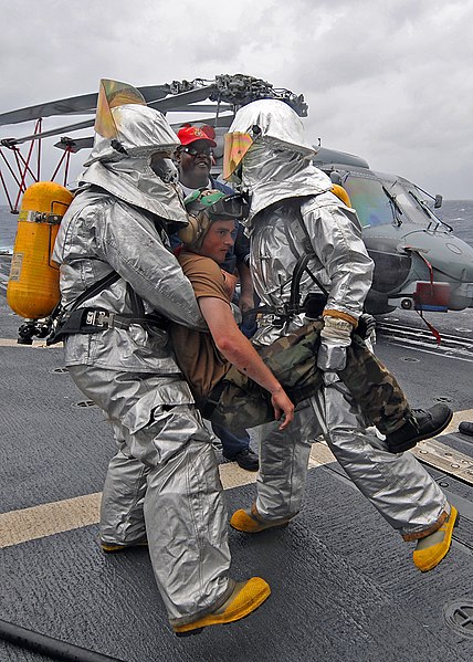 File:US Navy 080902-N-1082Z-020 Sailors assist an injured shipmate during casualty drills held aboard the guided-missile cruiser USS Vella Gulf (CG 72).jpg