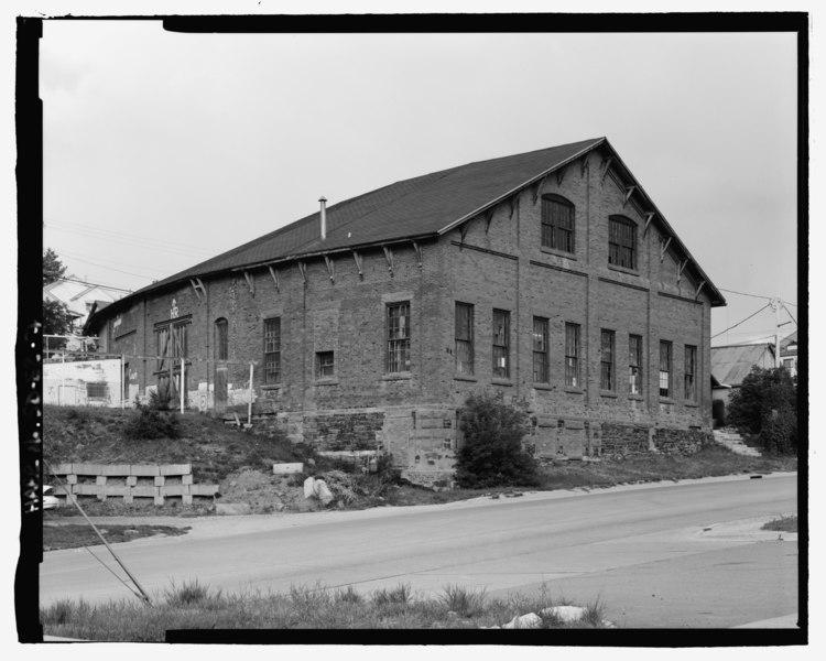 File:West side and north rear. View to southeast. - Black Hills and Fort Pierre Railroad Roundhouse, Terraville Avenue and Sunnyhill Road, Lead, Lawrence County, SD HAER SD-52-7.tif