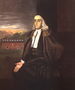 Een zittend portret van de oudere William Stoughton.  Stoughton Hall van Harvard College is zichtbaar op de achtergrond.