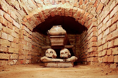Coffin in a brick-lined crypt under the church in Wola Gułowska, Lublin Voivodeship, Poland