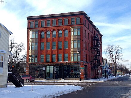 Horsefeathers Market opened in 2013 in the Italian Renaissance-style building historically known as the Zink Block, built in 1896 for William T. Zink's furniture sales and repair store to a design by Charles Day Swan, an architect native to the West Side. After the business closed in 1932, it was used variously as a grocery store, warehouse, and (most recently) as the home of Horsefeathers Antiques, which moved to Grant-Amherst in 2008. A neighborhood landmark that's still remarkably true to its original design, Horsefeathers Market has been renovated top-to-bottom into an energy-efficient "green" building with retail space on the ground floor and apartments above.