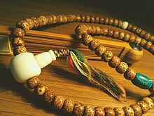 wooden bead necklace meaning