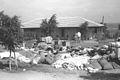 A SHAMBLES OF CLOTHING, BLANKETS AND SACKS WITH GRAIN LEFT OVER BY BRITISH TROOPS AFTER A SEARCH FOR ARMS AT KIBBUTZ DOROT. מראה כללי לאחר חיפוש סליקיD1-104.jpg