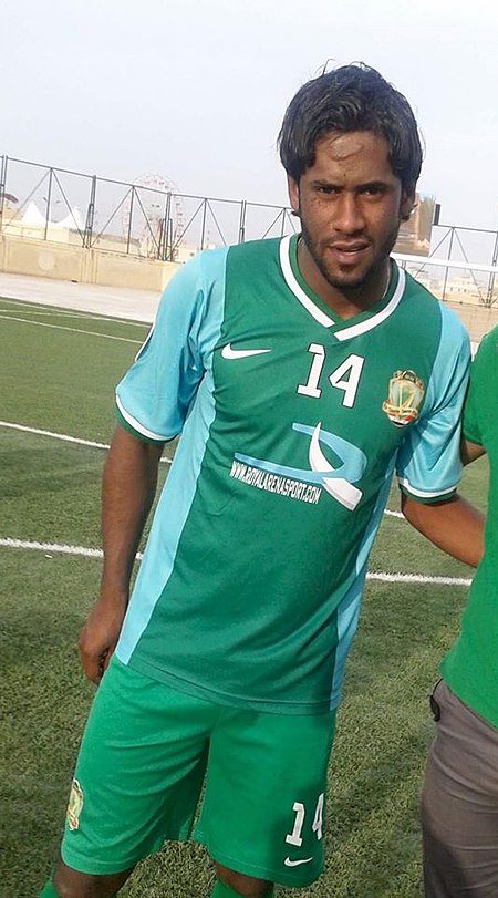 Amjad Kalaf in Al-Shorta kit after match with Al-Samawa, 26 April 2014.jpg