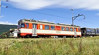 Be 4/4 15 der MBC mit Rollbock-Zug in Bière, 2020