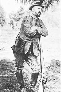 Boer War Boer general Tobias Smuts, leaning on a rifle.