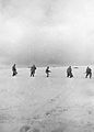Borci notranjskega odreda jurišajo preko Loške doline na sovražnikove položaje januar 1945.jpg