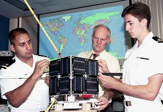 Bob Bruninga WB4APR (center) with USNA-1 / PCSat, September 2001
