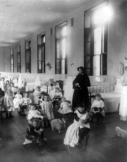 Sister Irene of New York Foundling Hospital with children. Sister Irene is among the pioneers of modern adoption, establishing a system to board out children rather than institutionalize them. Children at New York Foundling cph.3a23917.jpg