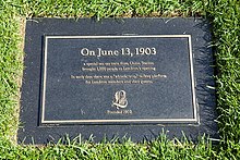 A plaque commemorating the opening of the golf club in June 1903. Course opening and train.jpg