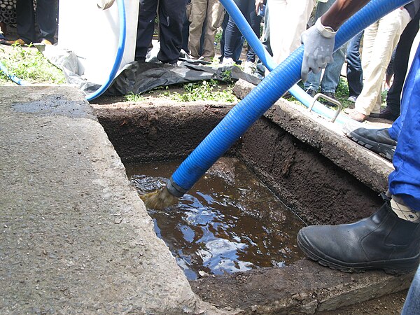 Fecal sludge being pumped out of a pit latrine in Durban, South Africa