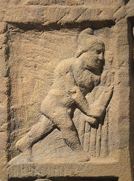 File:Detail of Mithras the hunter relief naked Mithras in Phrygian cap walking with a knife in his right hand, Museum Schloss Fechenbach, Dieburg, Germany (9352458048).jpg