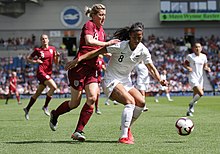 Ellen White and Abby Erceg compete for the ball in the women's international friendly between England and New Zealand, at Falmer in 2019.