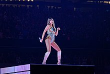 Taylor Swift in a sparkling body suit onstage