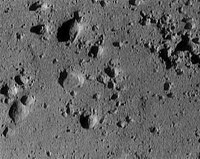 Eros from approximately 250 meters altitude (area in image is roughly 12 meters across). This image was taken during NEAR's descent to the surface of the asteroid. Erosregolith.jpg