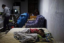 The inside of an Israeli bomb shelter in 2012 Flickr - Israel Defense Forces - Israelis Hiding in a Bomb Shelter.jpg