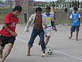 Cambodian boys playing football