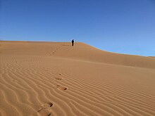 File:Footprints_on_the_sand.jpg