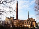 Heating plant with technical equipment, consisting of a coal bunker system, boiler house, chimney, machine room, administration building