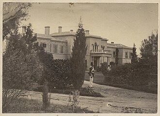 Government House with an Imperial soldier on duty (latter were withdrawn in 1870) Government House, Adelaide, 1865.jpg