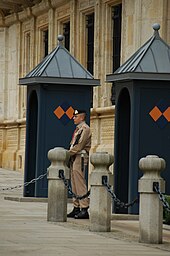 A soldier of the Luxembourg Army standing guard at the palace in 2007 Guard in front of the Palace, Luxembourg.JPG