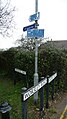 English: The junction of Worsley Road and Shore Road, Gurnard, Isle of Wight, along with Winding Way, which - despite being a public footpath shortcutting Shore Road - also has its own proper road name sign.