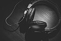 Headphones on wood in black and white (Unsplash).jpg