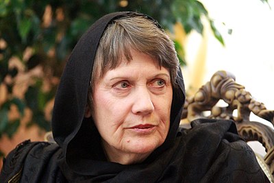 Clark wearing hijab in Tehran during a meeting with Iranian President Hassan Rouhani, 4 August 2013