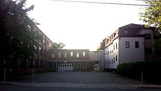 This is a photo of the main entrance to Holy Angels High School in Sydney, Nova Scotia. The school was permanently closed in June 2011 though was renovated into an arts and culture centre Holy Angels High School 2012.jpg