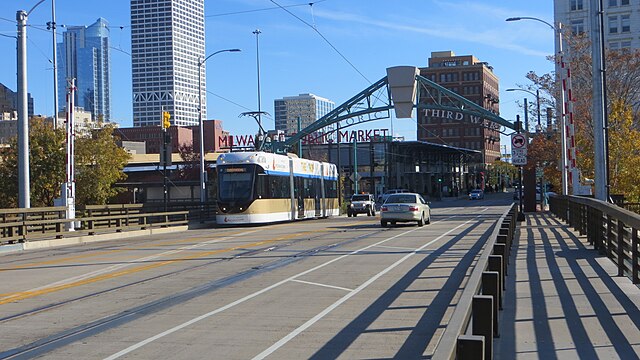 A streetcar crosses the St. Paul Avenue Bridge over the Milwaukee River