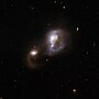 Thumbnail for File:Hubble Interacting Galaxy IRAS F10565 (2008-04-24).jpg