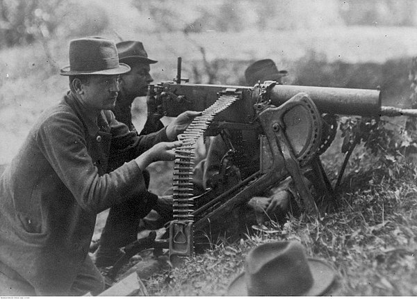 Silesian insurgents behind a MG 08 machine gun in action along the Oder river