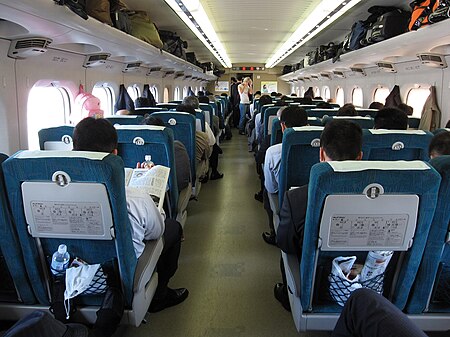 ไฟล์:Inside_of_JR_West_700_series_set_E12_(Rail_Star_non-reserved_car).jpg