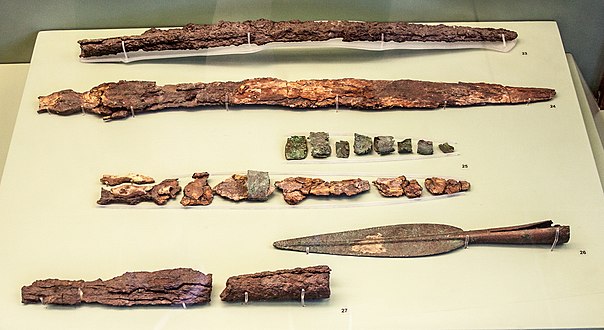 Iron and bronze arms from a warrior's urn cremation 900-850 BC.jpg
