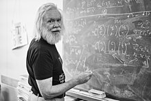 John Ellis by the blackboard.jpg