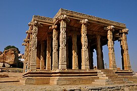 Carved pillars of the Saasivekaalu Ganesha Temple at Hemakuta Hill