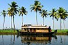 A typical houseboat floating down the backwaters near Alappuzha