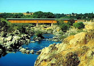 Low water on the Stanislaus River at Knights Ferry Covered Bridge Knights Ferry covered bridge Stanislaus River.jpg