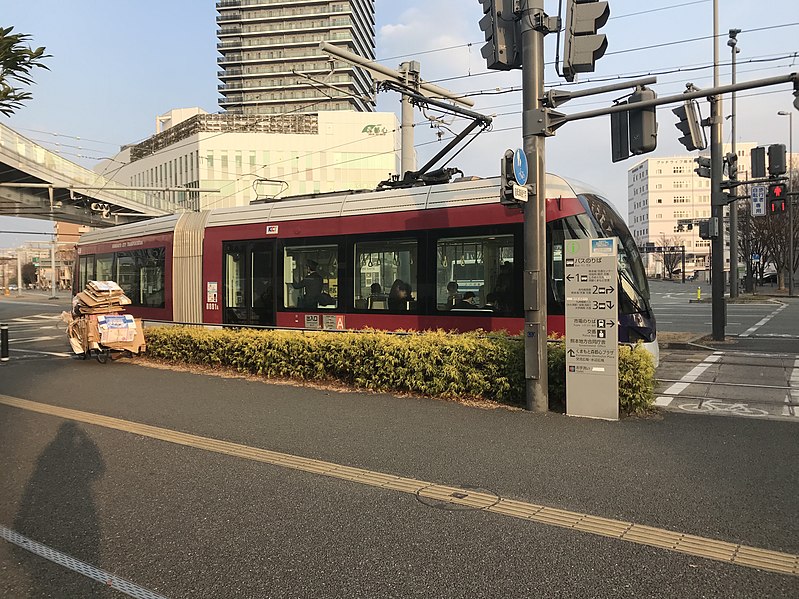 File:Kumamoto City Tram near Kumamoto-Ekimae Station.jpg