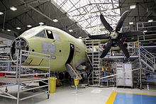 A C-27J Spartan on the assembly line in Italy MINISTRO CATERIANO SOSTUVO REUNIONES CON AUTORIDADES DE DEFENSA DE ITALIA (13938033560).jpg