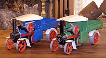 A blue SW1 wagon from 1988 and a green SW1 wagon from 1973. Mamod Steam wagons from 1988 and 1973.jpg