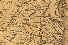 The Orange and Alexandria Railroad (highlighted) in 1852. The Washington District follows these two segments plus an additional bypass line connecting them that was built in 1880. Map showing the Orange and Alexandria Railroad.jpg