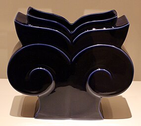 Postmodern vase inspired by the Ionic capital, deisgned by Michael Graves for Swid Powell, 1989, glazed porcelain, Indianapolis Museum of Art, Indianapolis, US[33]