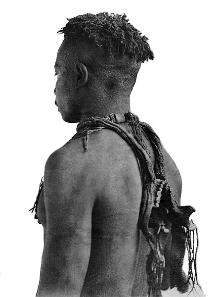 File:Native wearing jaw of dead relative, Andaman Islands Wellcome M0005249.jpg