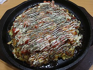 Okonomiyaki with tomato and cheeze (4716607523).jpg