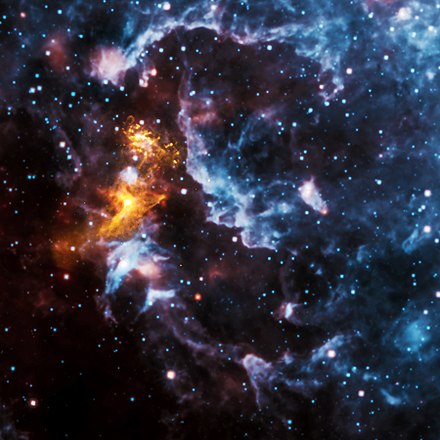 Radiation from the rapidly spinning pulsar PSR B1509-58 makes nearby gas emit X-rays (gold) and illuminates the rest of the nebula, here seen in infrared (blue and red).