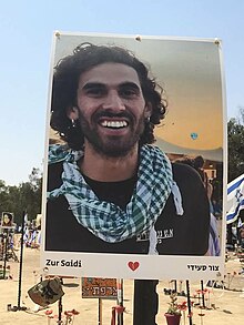 Photo of Zur Saidi who was murdered at the Nova Music Festival on 7 October 2023 Photo of Zur Saidi wearing a kaffiah.jpg