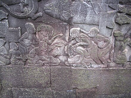 Bas relief of cockfighting from the Khmer Empire, 12th/13th century